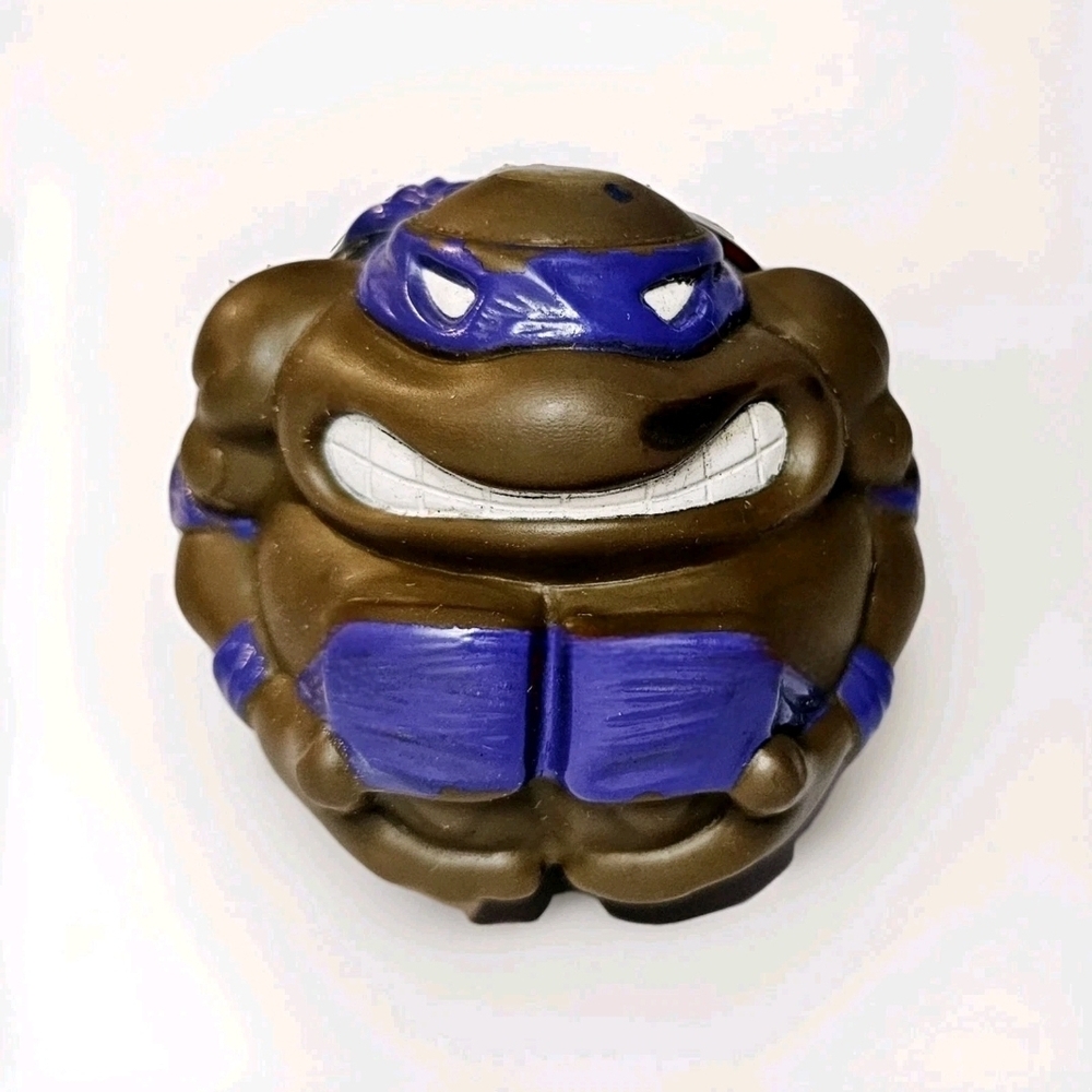Reptile Toy with Purple and Brown Design